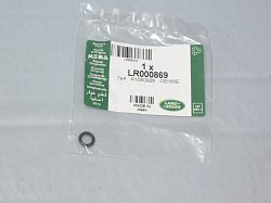 LR000869 Кольцо уплотнительное пробки АКПП 