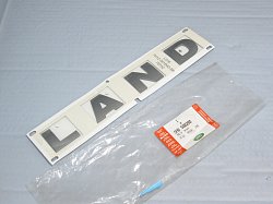 DAB500290 Буквы капота "LAND" DEF c 2007 - 